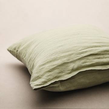 Nahaufnahme der Leinenstruktur des Hufnagel Wool Pillow